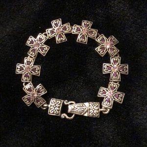 Silver toned bracelet with pink and purple stones